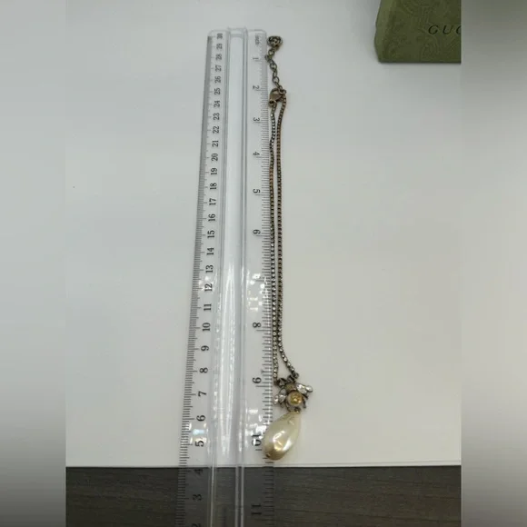 Gucci Gold-tone, crystal and faux pearl necklace - Picture 14 of 14